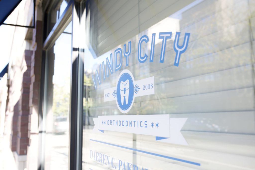 Windy City Orthodontics signage on window